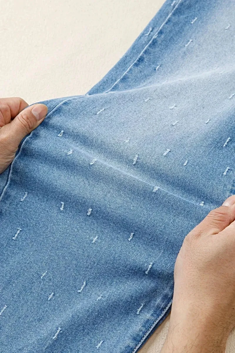 Stijlvolle jeans met een verwassen look, buikcorrigerend effect, rafelige zoom en functionele zakken.