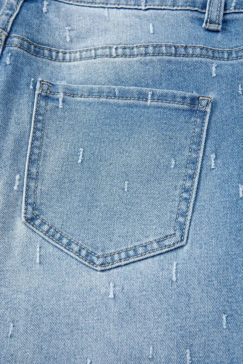 Stijlvolle jeans met een verwassen look, buikcorrigerend effect, rafelige zoom en functionele zakken.