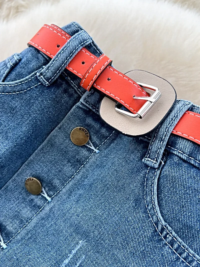 Gestreepte patchworkrok in grote maten met asymmetrisch design en onafgewerkte zoom voor een moeiteloze stijl.