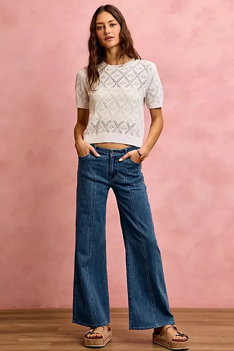 Elegante stretchdenim jeans met middelhoge taille en stijlvolle naaddetails voor comfort de hele dag door.