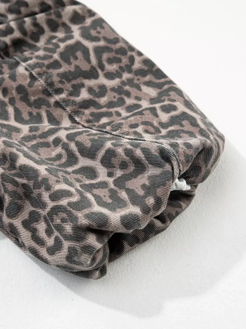 Stijlvolle top met luipaardprint en ruches aan de zoom - Gemaakt van denimstof voor een moeiteloos chique look.
