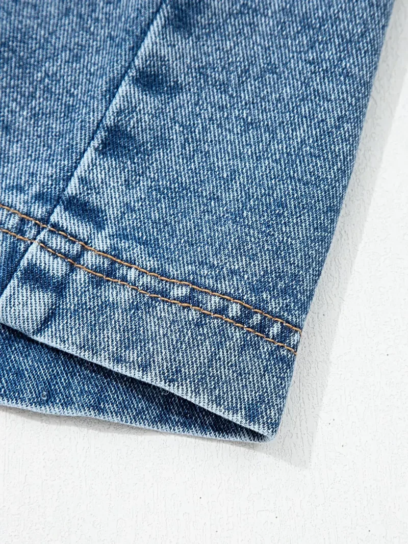 Stijlvolle mouwloze denim jurk met riem en knoopjes - casual chic voor elke gelegenheid