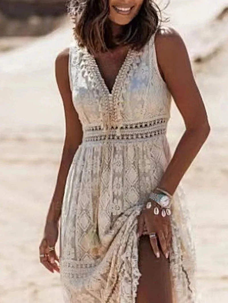 Elegante maxi-jurk met V-hals en kanten details en kwastjes - mouwloos, 100% polyesterstof
