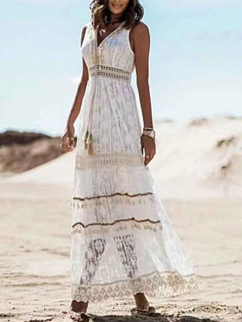 Elegante maxi-jurk met V-hals en kanten details en kwastjes - mouwloos, 100% polyesterstof