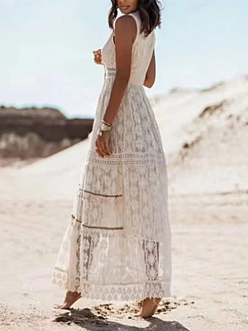 Elegante maxi-jurk met V-hals en kanten details en kwastjes - mouwloos, 100% polyesterstof