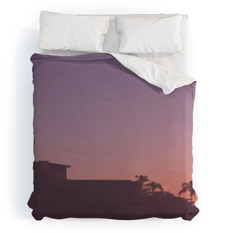 Los Angeles USA I Pastel California sky at sunset with palm tree silhouettes and Hollywood house Duvet Cover
