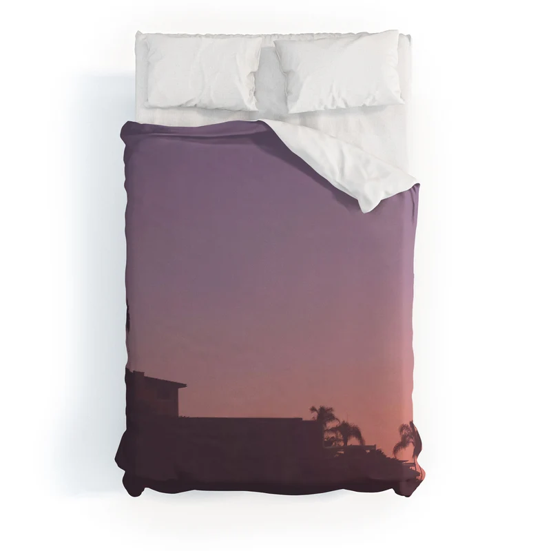 Los Angeles USA I Pastel California sky at sunset with palm tree silhouettes and Hollywood house Duvet Cover