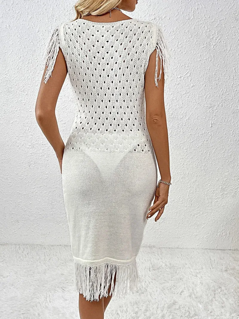 Trui-jurk met franjes, opengewerkte boothals en elegante, opvallende franjes.