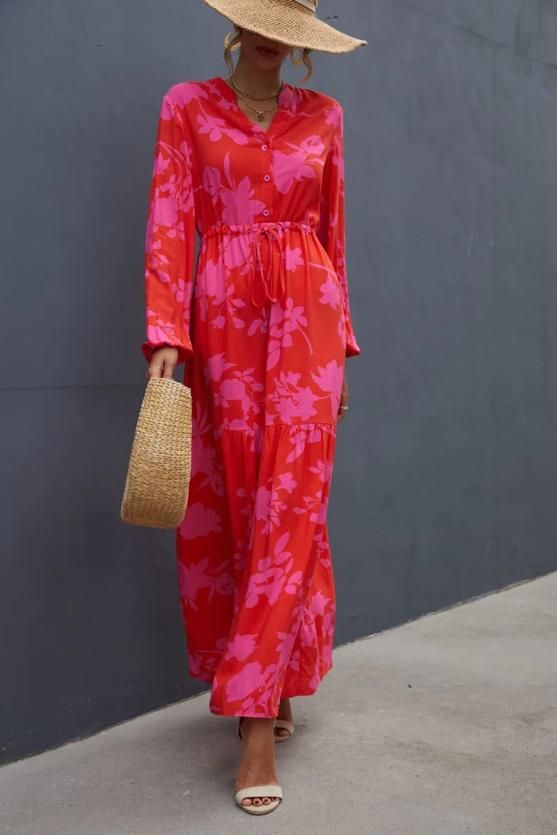 Chique maxi-jurk met bloemenprint, trekkoord in de taille en lange mouwen – perfect voor elke gelegenheid.