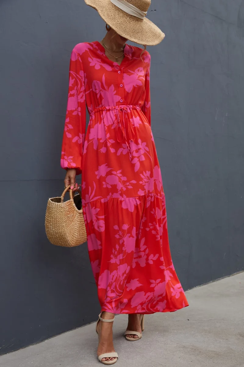 Chique maxi-jurk met bloemenprint, trekkoord in de taille en lange mouwen – perfect voor elke gelegenheid.