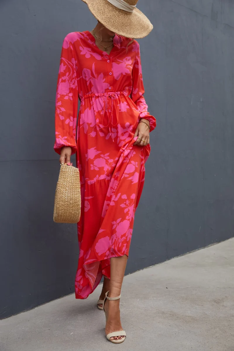 Chique maxi-jurk met bloemenprint, trekkoord in de taille en lange mouwen – perfect voor elke gelegenheid.