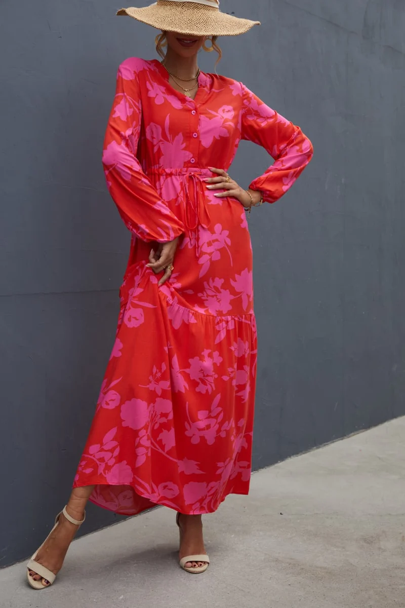 Chique maxi-jurk met bloemenprint, trekkoord in de taille en lange mouwen – perfect voor elke gelegenheid.
