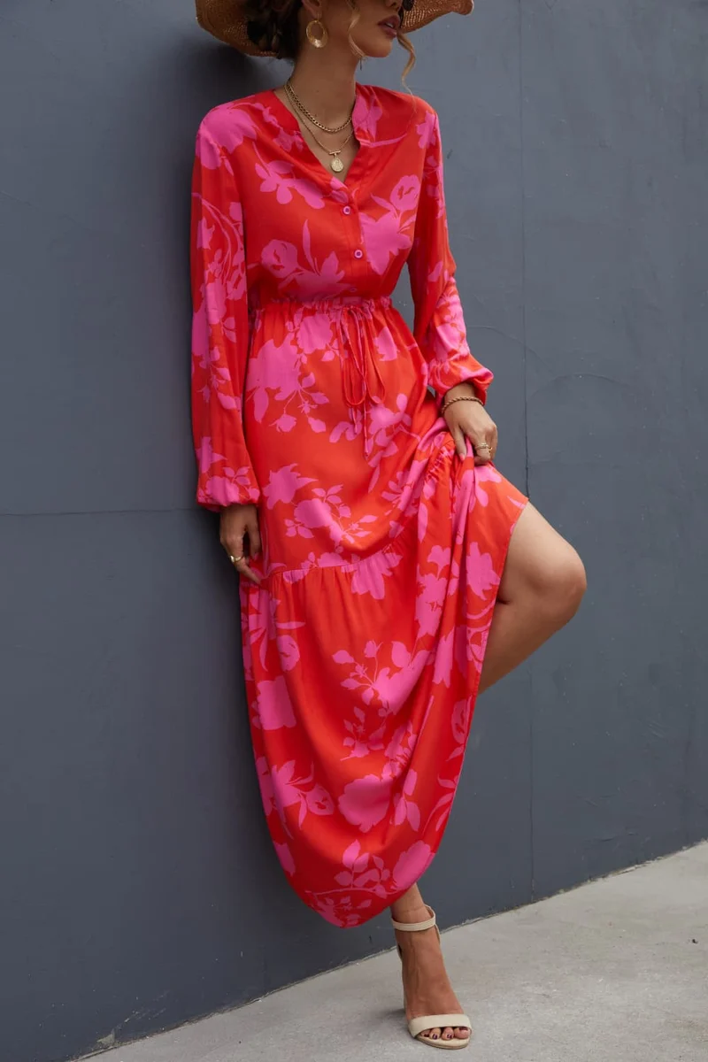 Chique maxi-jurk met bloemenprint, trekkoord in de taille en lange mouwen – perfect voor elke gelegenheid.