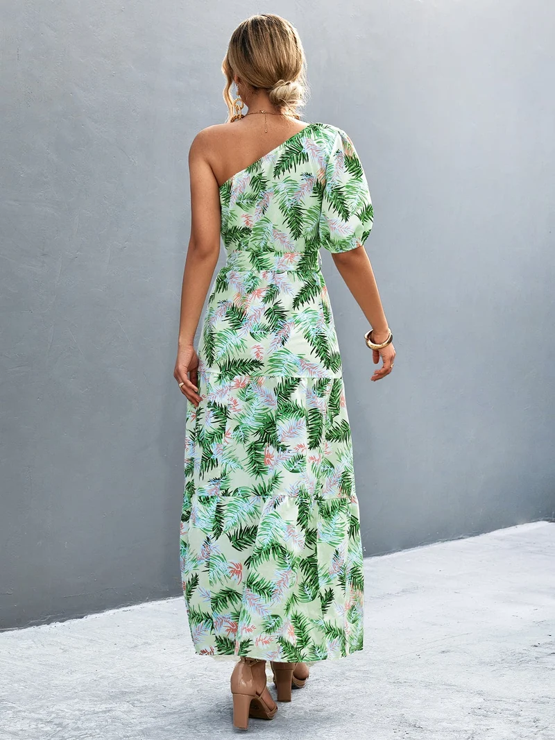 S-XL • Maxi-jurk met één schouder • Bedrukt A-lijn model • Strikceintuur • Ballonmouwen