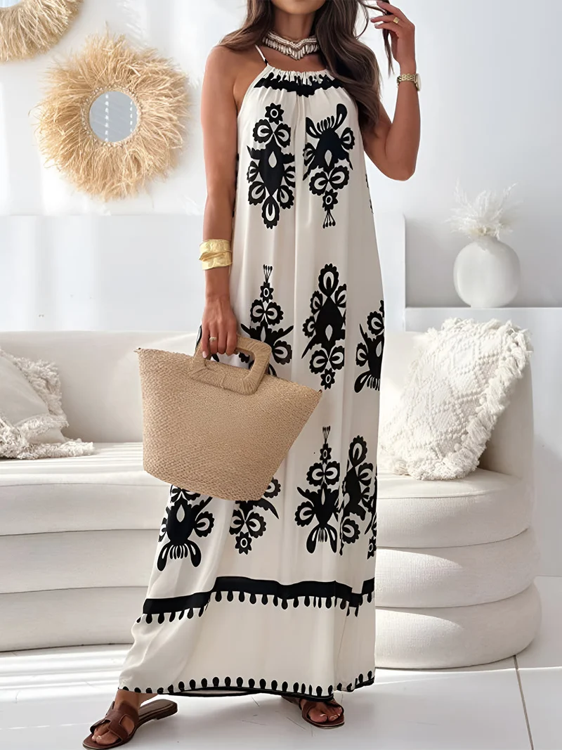 Elegante maxi-jurk met print en spaghettibandjes, zonder mouwen - de perfecte maxi-jurk voor de zomer.