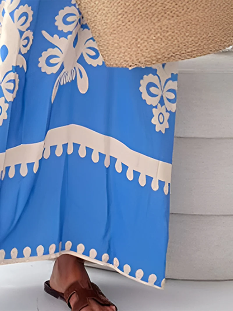 Elegante maxi-jurk met print en spaghettibandjes, zonder mouwen - de perfecte maxi-jurk voor de zomer.