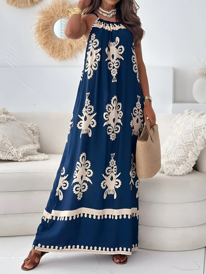 Elegante maxi-jurk met print en spaghettibandjes, zonder mouwen - de perfecte maxi-jurk voor de zomer.