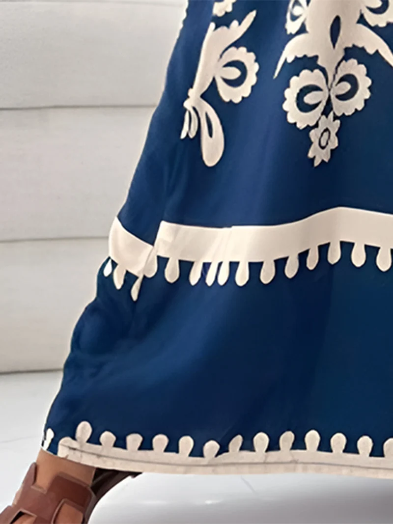 Elegante maxi-jurk met print en spaghettibandjes, zonder mouwen - de perfecte maxi-jurk voor de zomer.