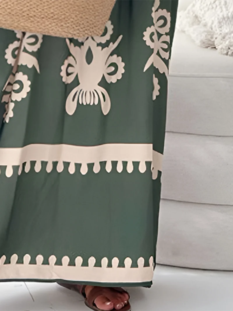 Elegante maxi-jurk met print en spaghettibandjes, zonder mouwen - de perfecte maxi-jurk voor de zomer.