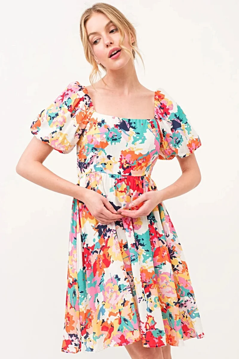 Jurk met bloemenprint, pofmouwen, vierkante halslijn en zakken - Trendy damesmode