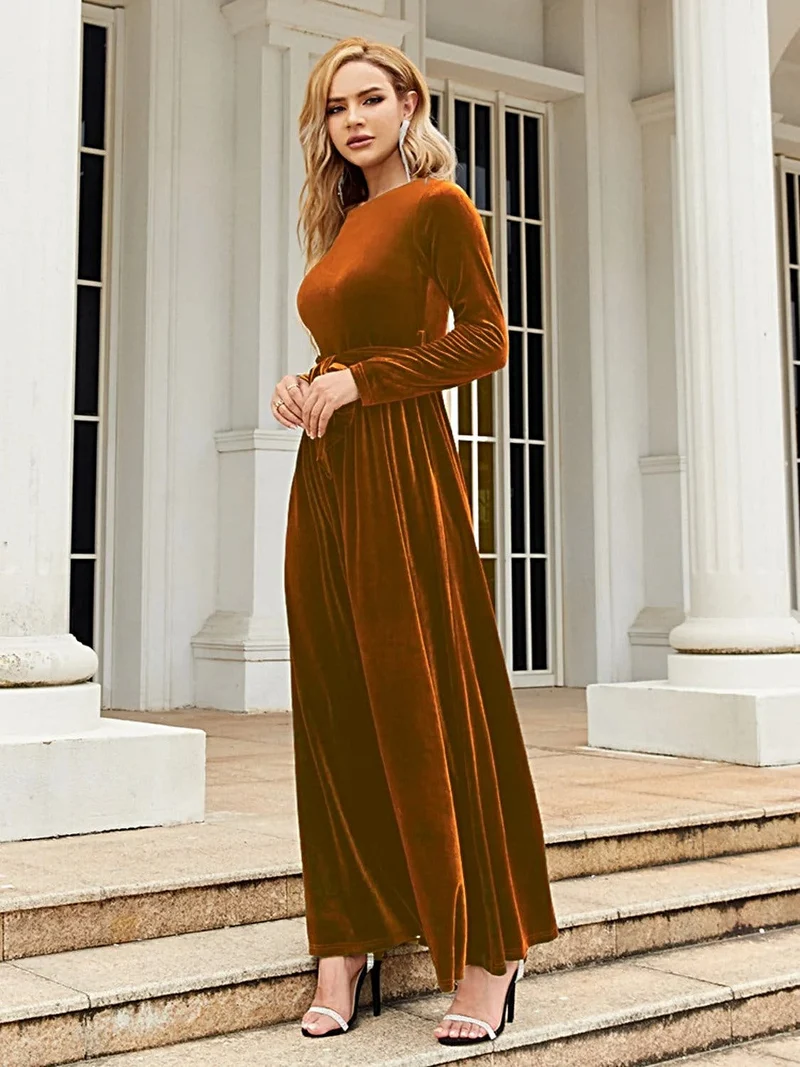 Elegante maxi-jurk met lange mouwen en strik aan de voorkant, gemaakt van ondoorzichtig polyester – comfortabel en stijlvol.