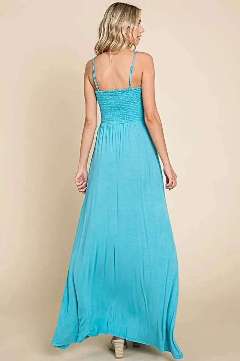 Elegante maxi-jurk met smockwerk en zakken - flatterende pasvorm en zwierige stijl.