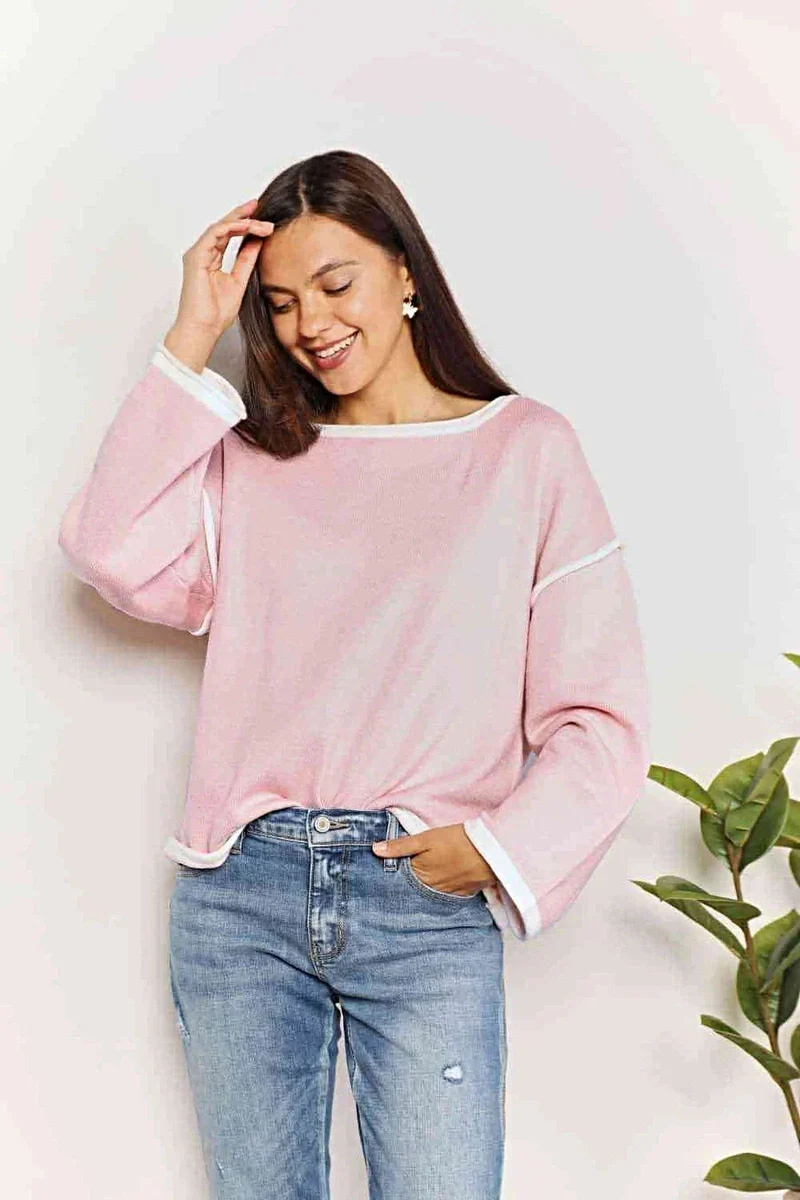 Luxe trui met boothals, contrasterende details en verlaagde schouders - stijlvolle gebreide top