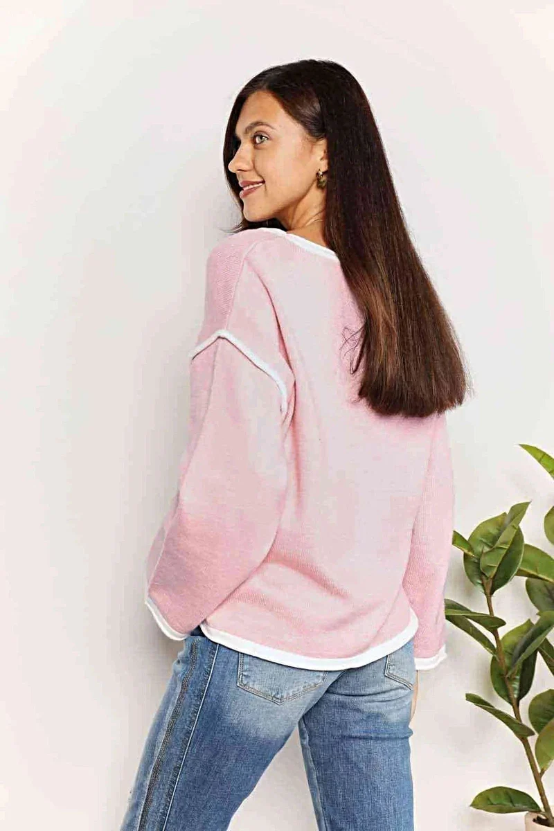 Luxe trui met boothals, contrasterende details en verlaagde schouders - stijlvolle gebreide top