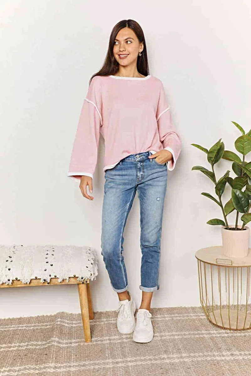 Luxe trui met boothals, contrasterende details en verlaagde schouders - stijlvolle gebreide top