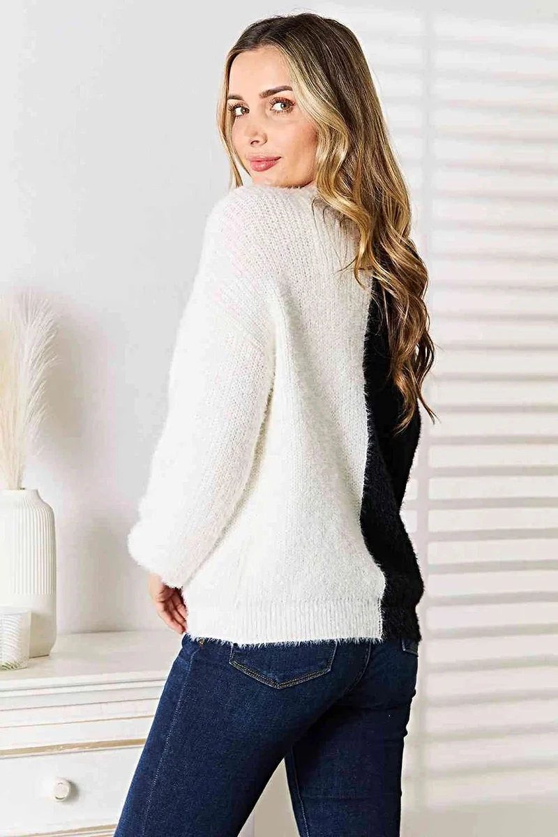 Stijlvol vest in contrasterende kleuren met knoopsluiting aan de voorkant en V-hals, verkrijgbaar in grote maten.
