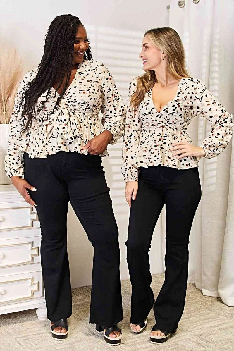 Levendige blouse met strikdetail en diepe V-hals voor een elegante en vrouwelijke look - 100% polyester