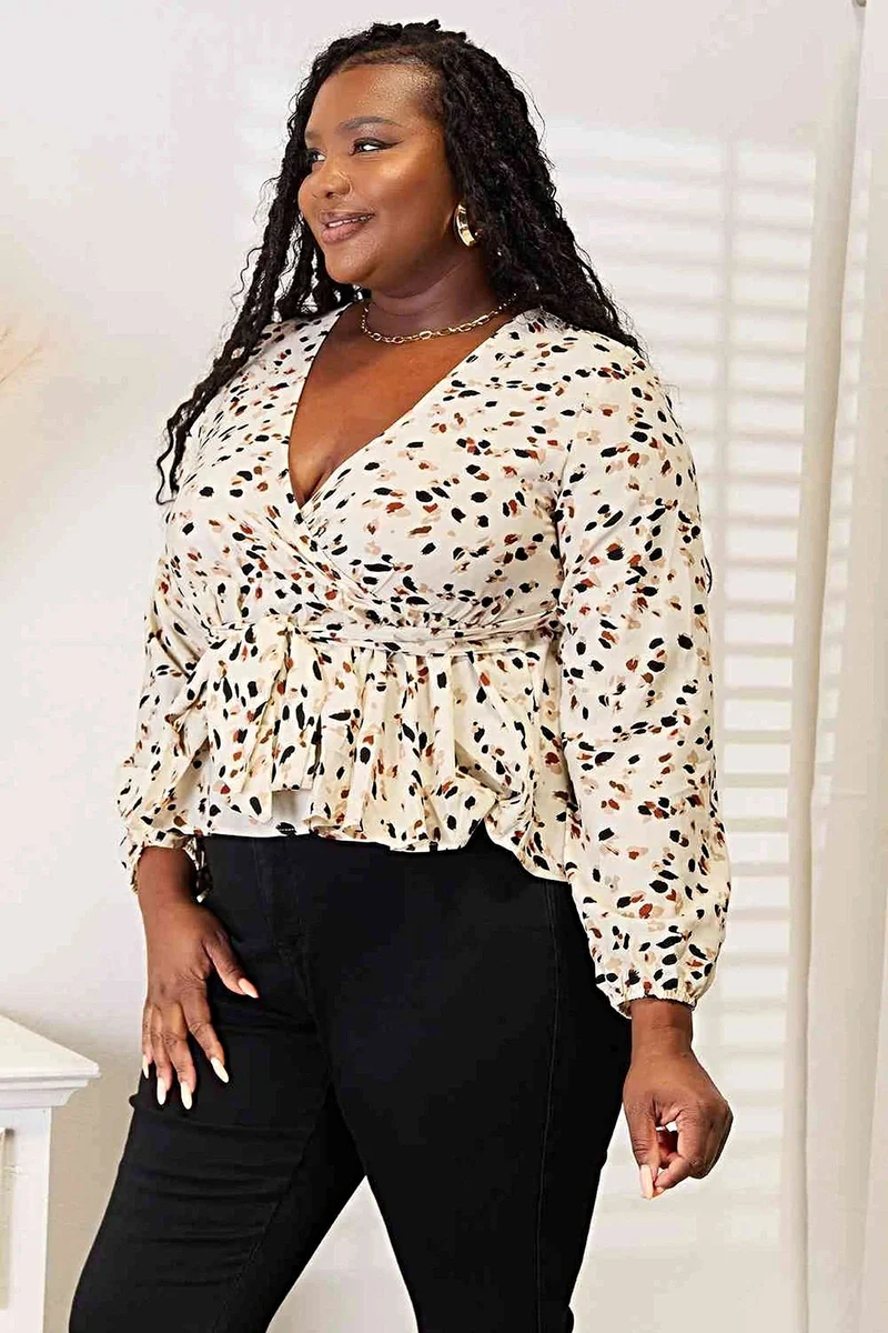 Levendige blouse met strikdetail en diepe V-hals voor een elegante en vrouwelijke look - 100% polyester