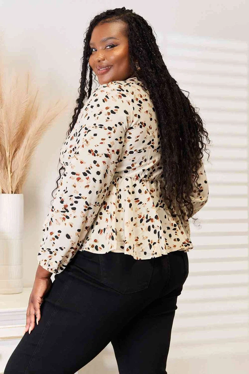 Levendige blouse met strikdetail en diepe V-hals voor een elegante en vrouwelijke look - 100% polyester