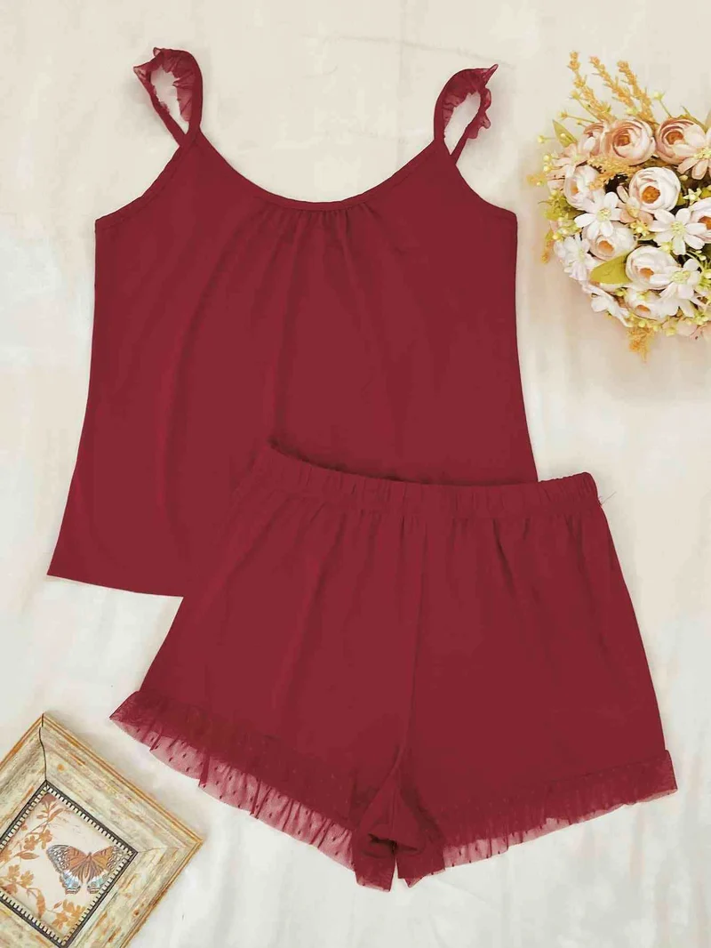 Chique mouwloze loungeset met geplooide details en gesplitste mesh top en shorts