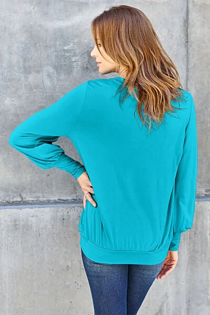 Luxe basic top met V-hals en pofmouwen - Licht elastische, ondoorzichtige blouse voor een moeiteloze stijl.