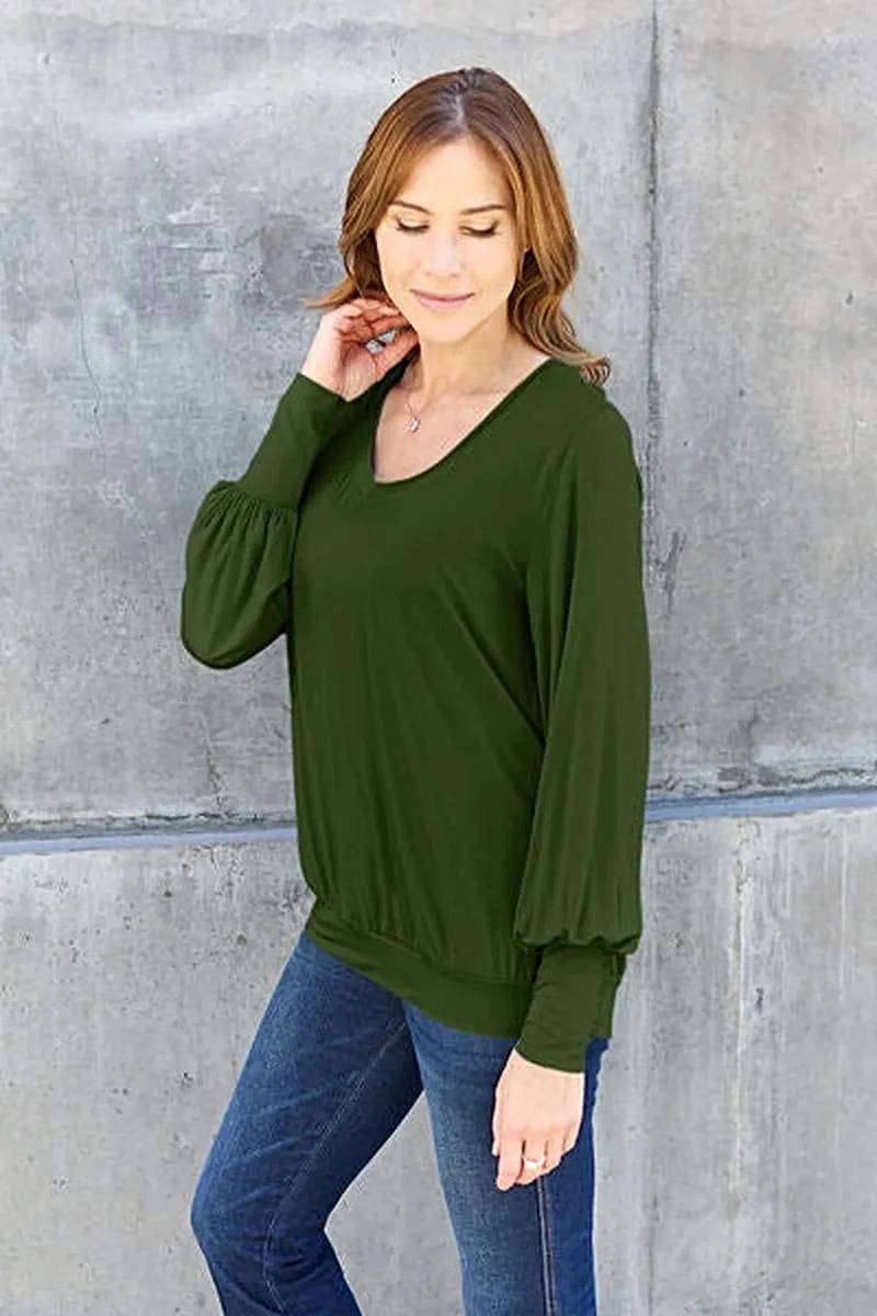 Luxe basic top met V-hals en pofmouwen - Licht elastische, ondoorzichtige blouse voor een moeiteloze stijl.