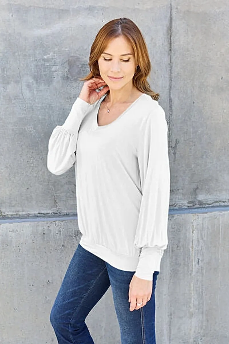 Luxe basic top met V-hals en pofmouwen - Licht elastische, ondoorzichtige blouse voor een moeiteloze stijl.
