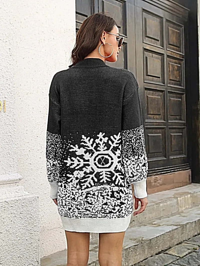 Elegante sweaterjurk met sneeuwvlokkenpatroon, licht elastisch en met ribbels.