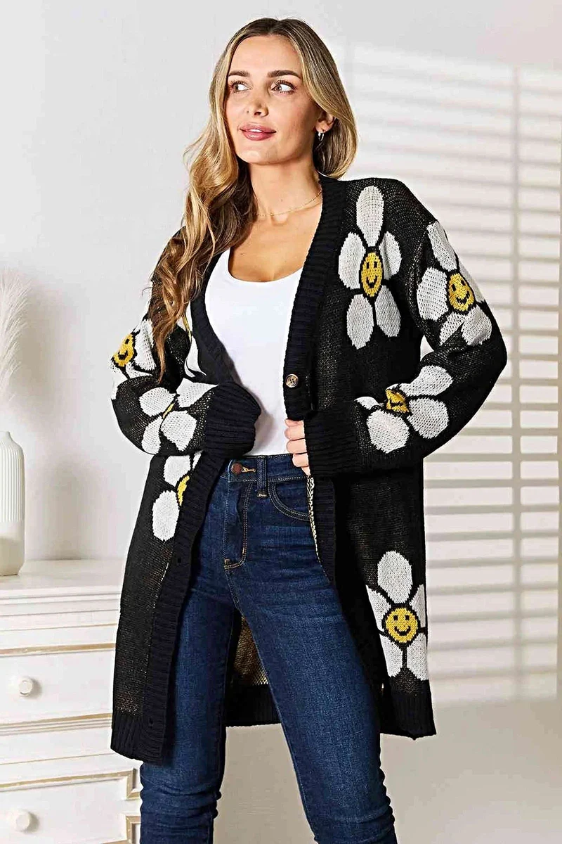 Lange cardigan met bloemenprint - elegante knoopsluiting, ribdetails en een gemiddelde stretch.