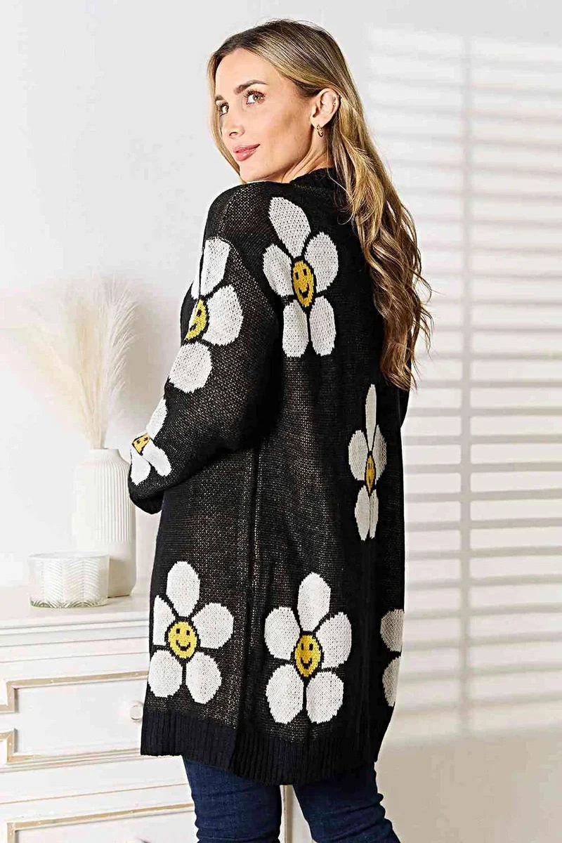 Lange cardigan met bloemenprint - elegante knoopsluiting, ribdetails en een gemiddelde stretch.