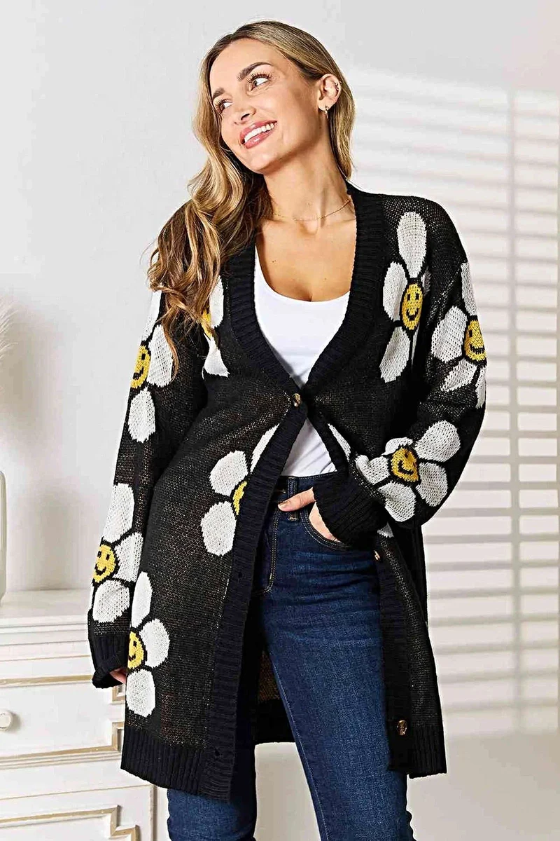 Lange cardigan met bloemenprint - elegante knoopsluiting, ribdetails en een gemiddelde stretch.