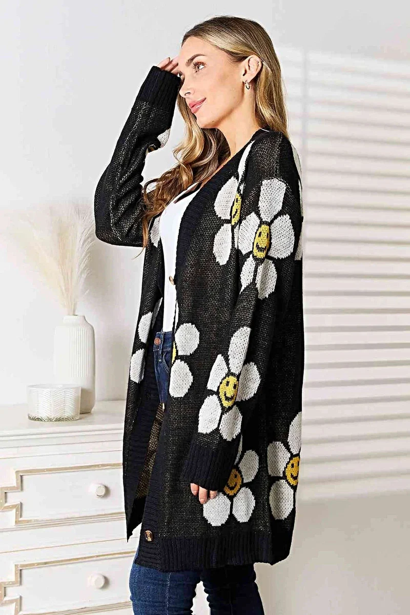 Lange cardigan met bloemenprint - elegante knoopsluiting, ribdetails en een gemiddelde stretch.