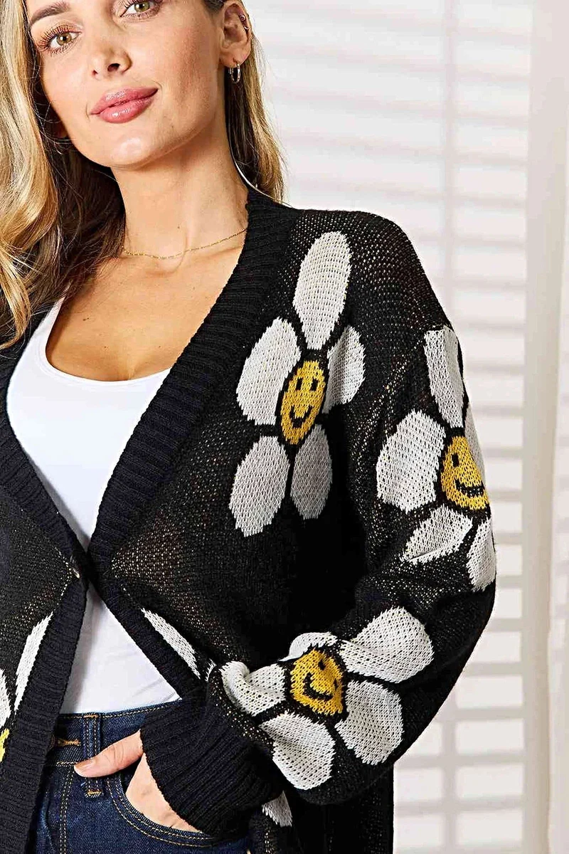 Lange cardigan met bloemenprint - elegante knoopsluiting, ribdetails en een gemiddelde stretch.