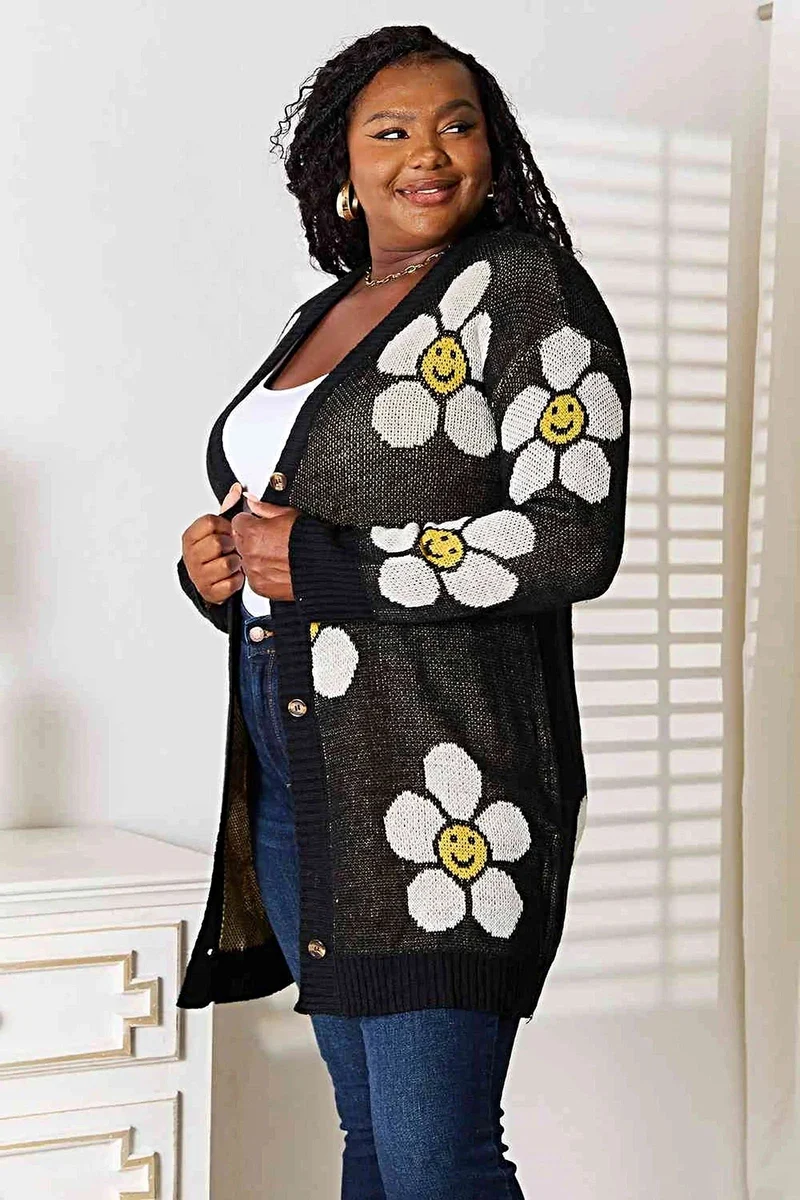 Lange cardigan met bloemenprint - elegante knoopsluiting, ribdetails en een gemiddelde stretch.
