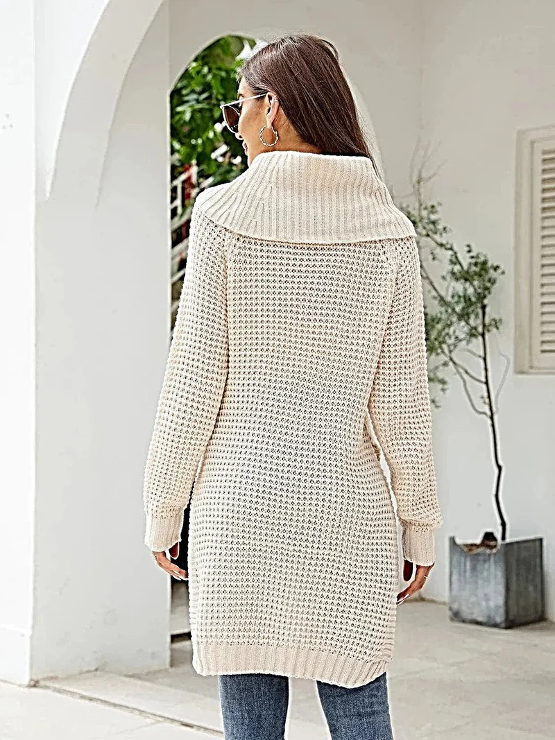 Luxe coltrui-jurk met wafelstructuur en split.