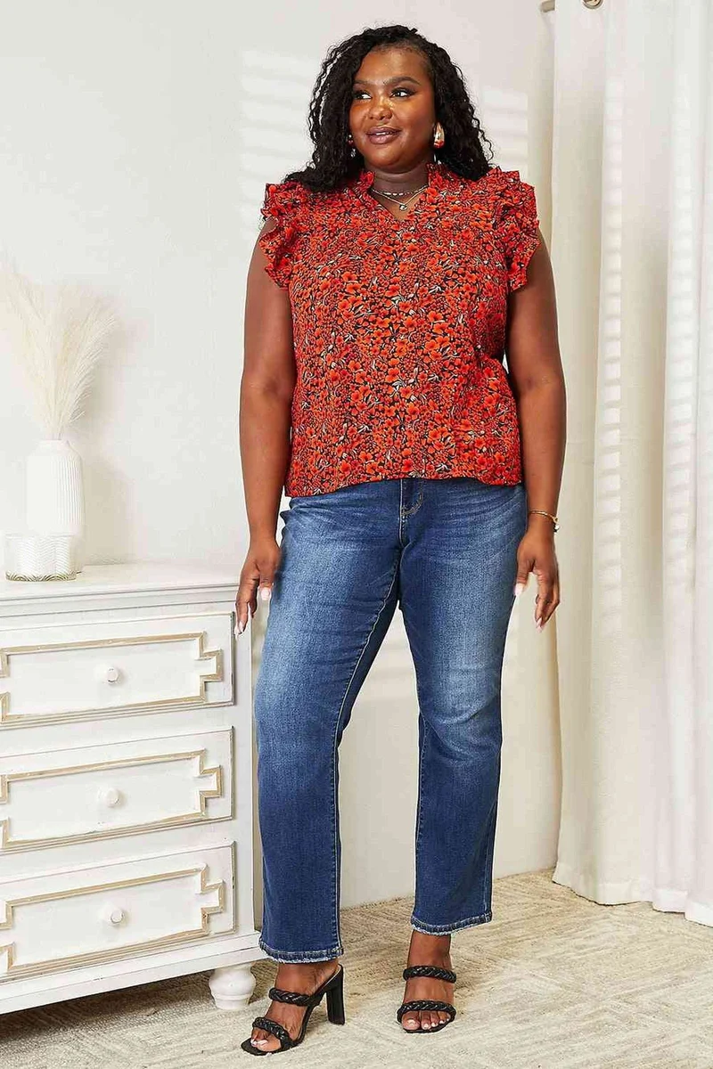 Elegantie opnieuw gedefinieerd: Blouse met bloemenprint en ruchesmouwen, en een chique inkeping in de halslijn.