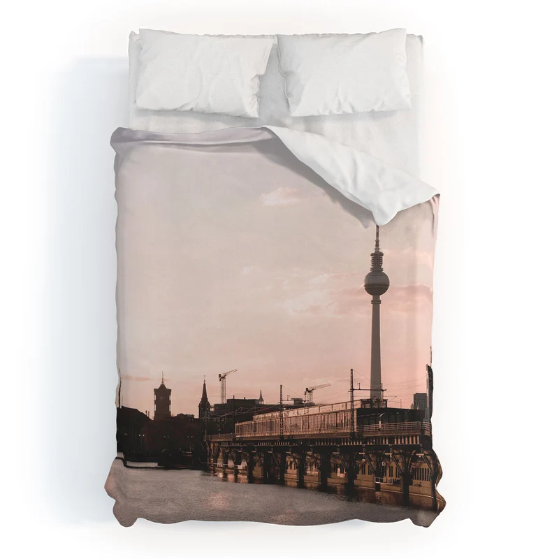 Berlin Germany I Fernsehturm television tower and Spree river at sunset in a pastel pink sky Duvet Cover