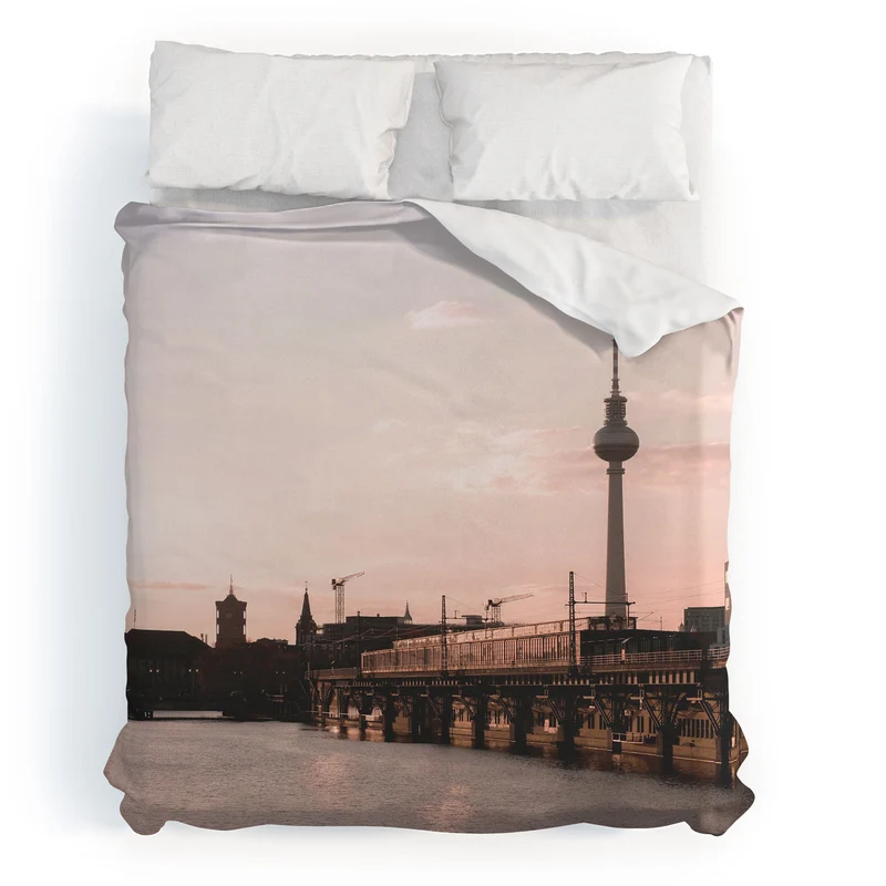 Berlin Germany I Fernsehturm television tower and Spree river at sunset in a pastel pink sky Duvet Cover