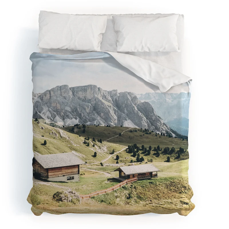 Dolomites Italy I Wooden chalets on the Seceda alpine meadow in the mountain of the Italian Alps Duvet Cover
