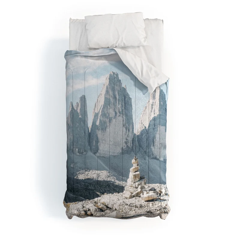Dolomites Italy I Stone cairn in front of Tre Cime di Lavaredo peaks in the Italian Alps mountains Comforter